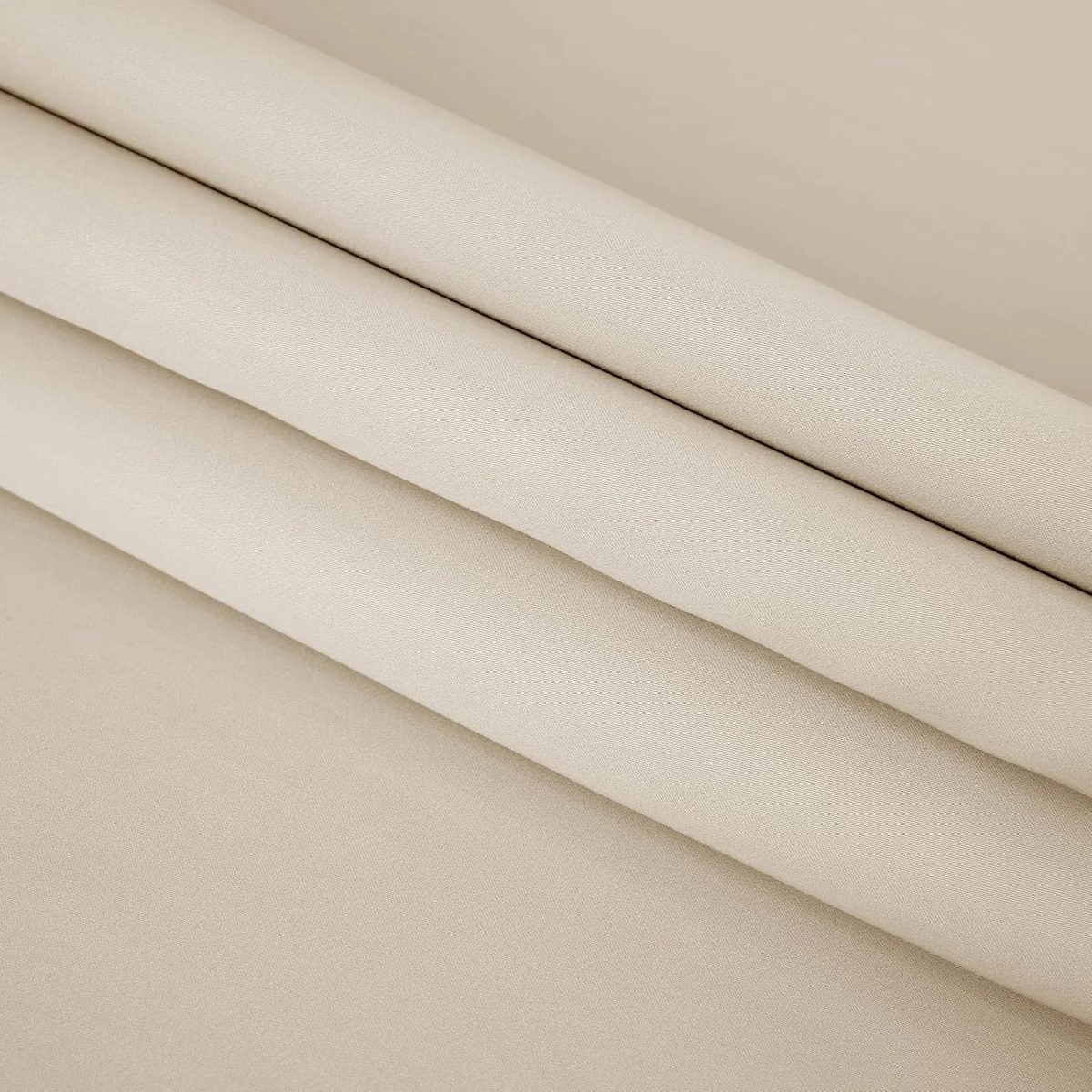 Tencel de Algodón color beige, doblada, para ver el color y el brillo discreto